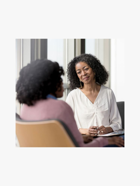Loveland Foundation Donation with two women on a light gray background